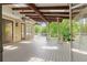Open porch with ceiling fans, skylights, and outdoor living space with views of the backyard at 2697 N Thompson Ne Rd, Atlanta, GA 30319