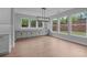 Bright dining room with hardwood floors and large windows at 4830 Briscoe Dr, Cumming, GA 30028