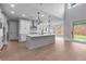 Gourmet kitchen features a large island and stainless steel appliances at 4830 Briscoe Dr, Cumming, GA 30028