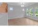 Bright living room with hardwood floors and large windows at 4830 Briscoe Dr, Cumming, GA 30028