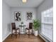 Bright dining area features modern decor and a view of the outdoors through a large window at 5381 Briar Creek Ln, Norcross, GA 30071