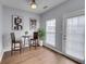 Cozy breakfast nook with modern decor and ample natural light from a nearby window and door at 5381 Briar Creek Ln, Norcross, GA 30071
