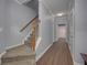 Hallway with staircase and luxury vinyl plank flooring at 5381 Briar Creek Ln, Norcross, GA 30071