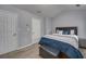 Comfortable main bedroom with carpeting, neutral paint, and bright windows at 5381 Briar Creek Ln, Norcross, GA 30071