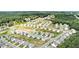 Aerial view showcasing the neighborhood layout with lush green spaces and a mix of housing styles at 7814 Messina Ct, Lithia Springs, GA 30122