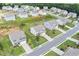 Aerial view showcasing a neighborhood's lush landscaping and well-maintained homes at 7814 Messina Ct, Lithia Springs, GA 30122