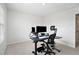 Bright office space with modern desk, ergonomic chair and natural light from the window at 7814 Messina Ct, Lithia Springs, GA 30122
