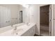 Bathroom with double sinks and a separate room for the toilet and shower at 98 Coopers Glen Sw Dr, Mableton, GA 30126