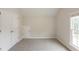 Cozy bedroom with a closet and a large window offering natural light and views at 98 Coopers Glen Sw Dr, Mableton, GA 30126