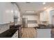 Modern kitchen featuring stainless steel appliances and granite countertops at 98 Coopers Glen Sw Dr, Mableton, GA 30126