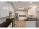 Modern kitchen featuring stainless steel appliances and granite countertops at 98 Coopers Glen Sw Dr, Mableton, GA 30126