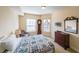 Bright bedroom with vintage decor, large windows, and a view at 230 E Ponce De Leon Ave # 324, Decatur, GA 30030