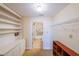 Spacious closet featuring shelving and a glimpse into an ensuite bathroom at 230 E Ponce De Leon Ave # 324, Decatur, GA 30030