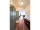Welcoming entryway with hardwood floors and a view into the living space at 230 E Ponce De Leon Ave # 324, Decatur, GA 30030