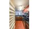 Modern kitchen with dark countertops, ample storage, and stainless steel appliances at 230 E Ponce De Leon Ave # 324, Decatur, GA 30030