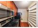 Bright kitchen featuring stainless steel appliances and wood cabinetry at 230 E Ponce De Leon Ave # 324, Decatur, GA 30030