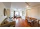 Cozy living room with hardwood floors, built-in shelving, and ample natural light at 230 E Ponce De Leon Ave # 324, Decatur, GA 30030