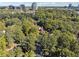 Beautiful wooded community with city skyline in the background at 30 Dunwoody Springs Dr, Atlanta, GA 30328