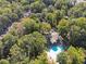 Aerial view of wooded community pool and surrounding landscape at 30 Dunwoody Springs Dr, Atlanta, GA 30328