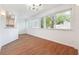 Cozy dining area with large windows and hardwood floors at 30 Dunwoody Springs Dr, Atlanta, GA 30328