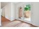 Bright hallway leading to private outdoor patio at 30 Dunwoody Springs Dr, Atlanta, GA 30328