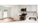 Well-equipped kitchen with stainless steel appliances and bright finishes at 30 Dunwoody Springs Dr, Atlanta, GA 30328