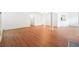 Open-concept living area with wood floors, seamlessly connecting to the kitchen, perfect for entertaining at 30 Dunwoody Springs Dr, Atlanta, GA 30328