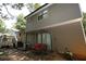 Backyard patio with swing and stairs, perfect for outdoor relaxation and leisure at 3227 Due West Rd, Dallas, GA 30157