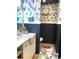 Stylish half bath with black and white walls featuring feather-patterned wallpaper and a modern vanity at 3227 Due West Rd, Dallas, GA 30157