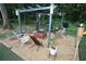 Cozy outdoor fire pit area with seating and stylish pergola, perfect for entertaining guests at 3227 Due West Rd, Dallas, GA 30157