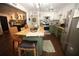 Bright kitchen with butcher block island, stainless steel appliances, and green cabinetry at 3227 Due West Rd, Dallas, GA 30157