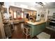 Open-concept kitchen and living room featuring wood floors and butcher block island at 3227 Due West Rd, Dallas, GA 30157