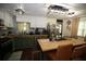 Spacious kitchen featuring stainless steel appliances, custom cabinets, and stylish lighting at 3227 Due West Rd, Dallas, GA 30157