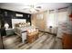 Serene main bedroom with modern decor, plank flooring, and a walk-in closet at 3227 Due West Rd, Dallas, GA 30157