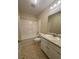 Bathroom with tub, vanity and tile floor at 525 Cherokee Overlook Ct, Canton, GA 30115