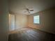 Bedroom featuring carpet, natural light and ceiling fan at 525 Cherokee Overlook Ct, Canton, GA 30115