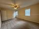 Bedroom featuring carpet, natural light and ceiling fan at 525 Cherokee Overlook Ct, Canton, GA 30115