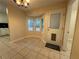 Cozy dining nook with bay windows and a welcoming doormat by the door at 525 Cherokee Overlook Ct, Canton, GA 30115