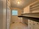 Bright office with built-in shelves and a spacious desk area, perfect for working from home at 525 Cherokee Overlook Ct, Canton, GA 30115