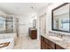 Bright bathroom with double vanity, granite countertop and separate shower and tub at 6825 Rambling Vale, Cumming, GA 30028