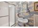 Compact bathroom featuring a pedestal sink and glass-enclosed shower at 747 Channing Nw Dr, Atlanta, GA 30318