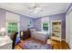 Bedroom with hardwood floors, and two windows providing plenty of natural light at 747 Channing Nw Dr, Atlanta, GA 30318