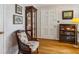 Foyer featuring hardwood floors, classic decor, and a view of the entrance door at 747 Channing Nw Dr, Atlanta, GA 30318