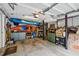 Organized garage space with ample storage, wall organizers, and room for vehicles at 747 Channing Nw Dr, Atlanta, GA 30318