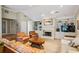 Inviting living room showcases a fireplace, built-in shelving, and ample seating, perfect for gatherings at 747 Channing Nw Dr, Atlanta, GA 30318