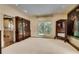 Spacious dining room with hardwood floors, built-in cabinets, and recessed lighting at 1676 Grove Park Way, Decatur, GA 30033