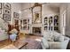 Bright living room boasts a fireplace, built-in bookshelves, and a vaulted ceiling at 1676 Grove Park Way, Decatur, GA 30033