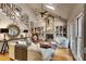 Spacious living room with a fireplace, built-in bookshelves, and a vaulted ceiling at 1676 Grove Park Way, Decatur, GA 30033