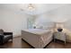 Bedroom featuring a large bed, hardwood floors, neutral walls and natural light at 175 Centennial Trce, Roswell, GA 30076