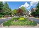 Stone entrance with landscaping and metal gates for a beautiful neighborhood at 175 Centennial Trce, Roswell, GA 30076